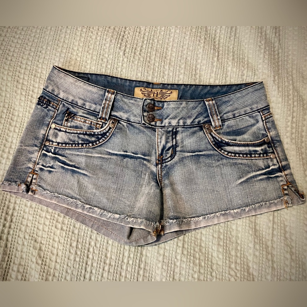 Size 9 jean shorts in faded denim style.
